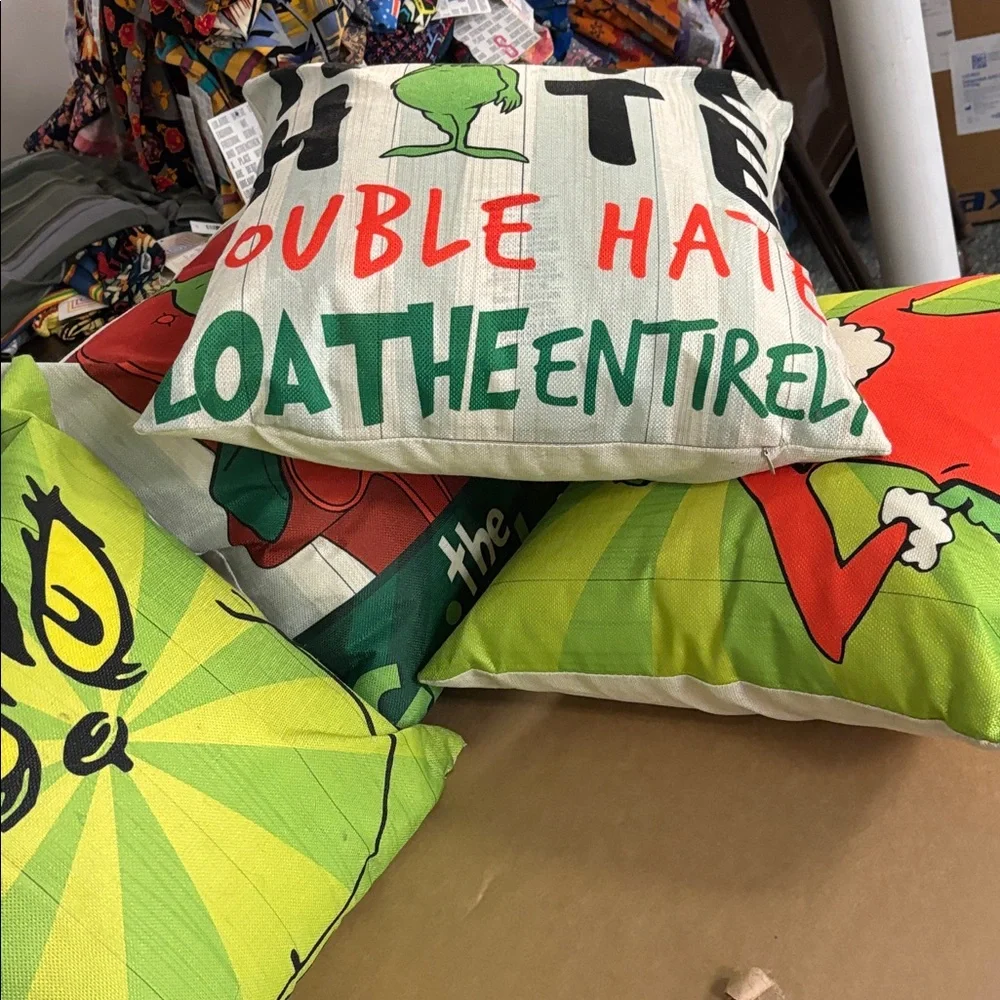 Green and Cream Decorative Pillows $20.00 for all 3,grinch themed.
